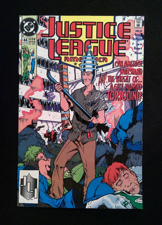 Justice League America #44 DC 1990 VF+  SIGNED BY JOSE MARZAN, ADAM HUGHES